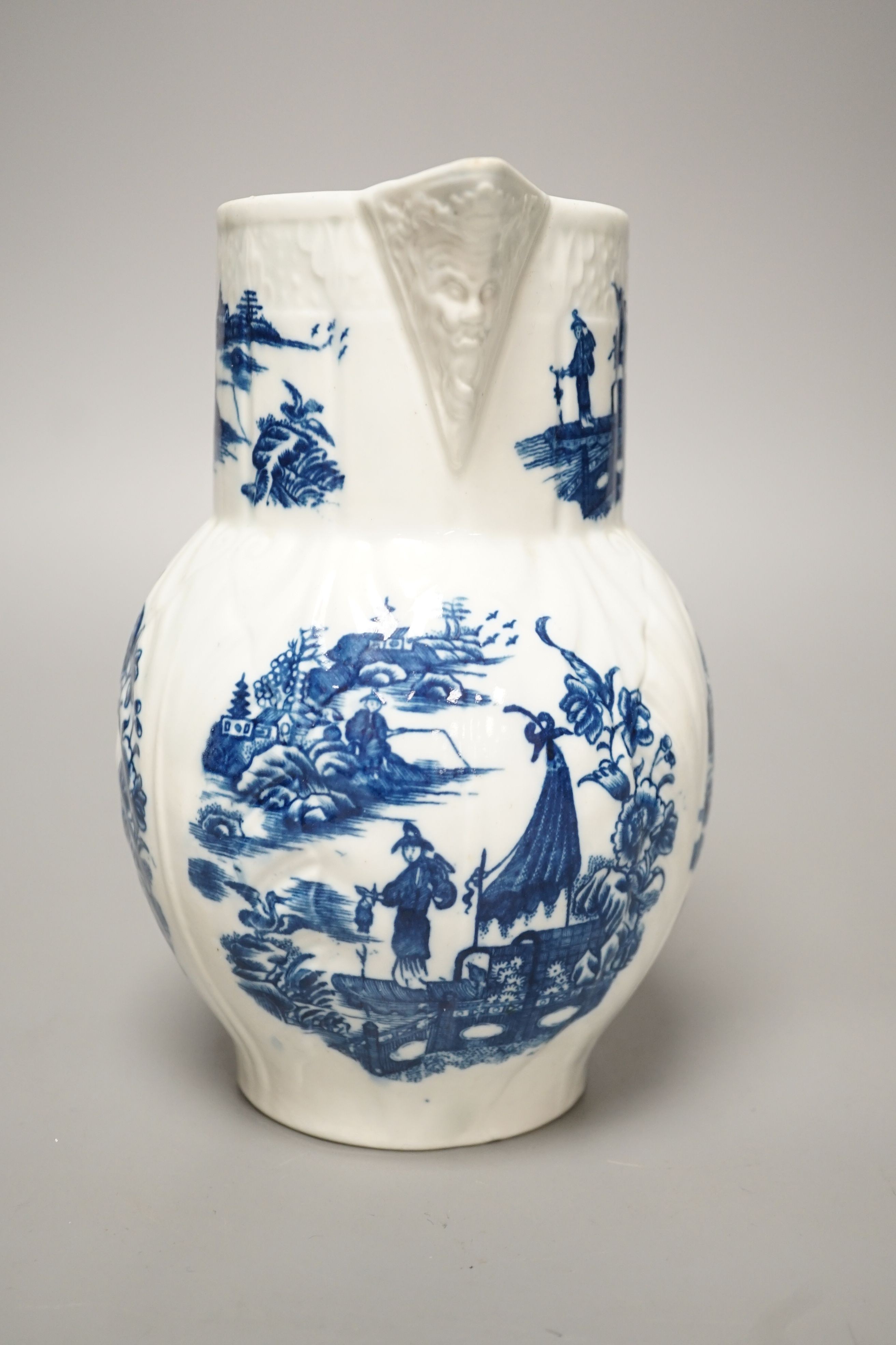 A Caughley mask jug printed with Fisherman pattern, c.1785, S mark, height 19cm